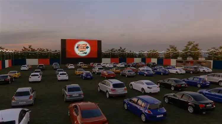 Cars lined up watching the big screen at Kent Drive In Cinema.