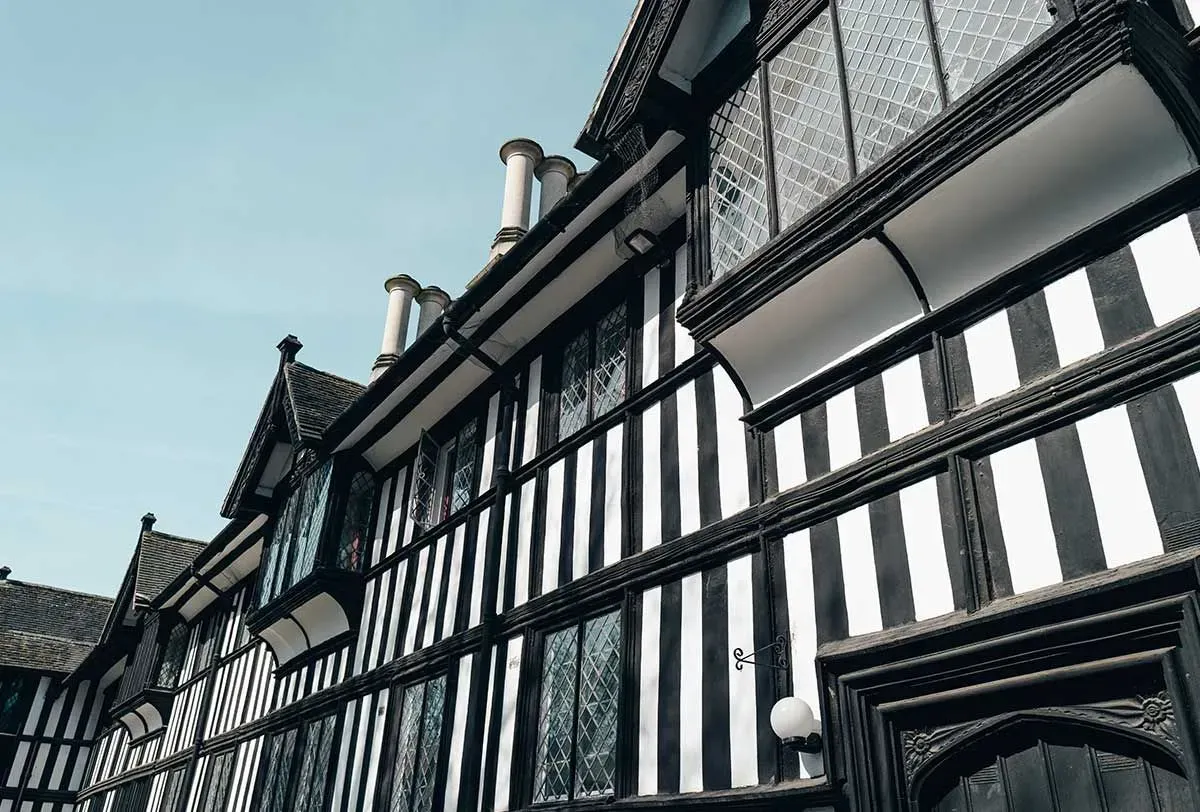 Tudor style houses on the street with their black and white design.