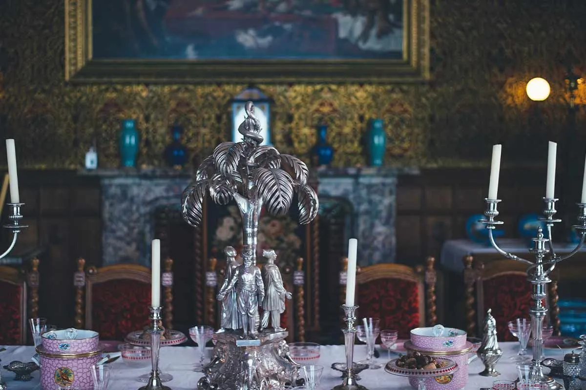 Elaborate table settings on a rich Victorian's dining table.