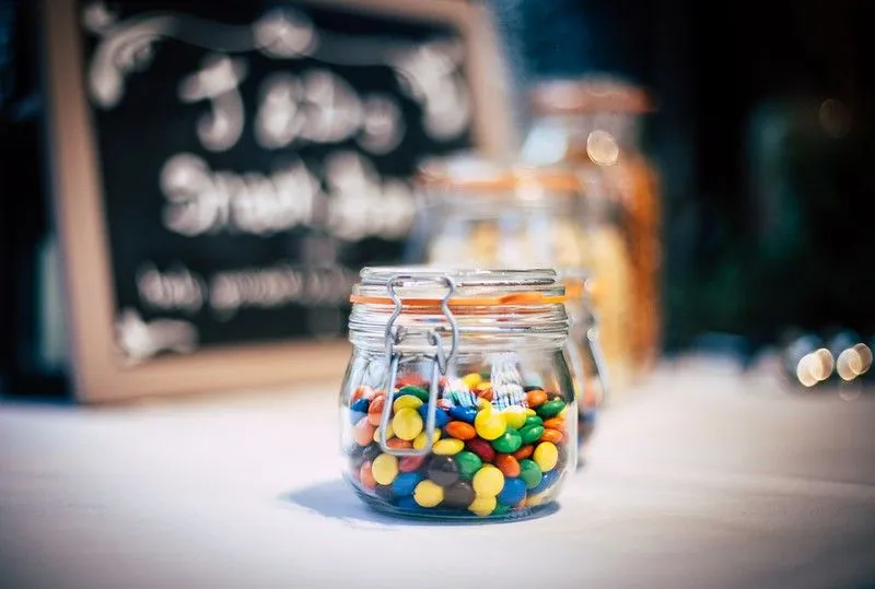 A jar of multicoloured Smarties which can be used to decorate a My Little Pony cake.