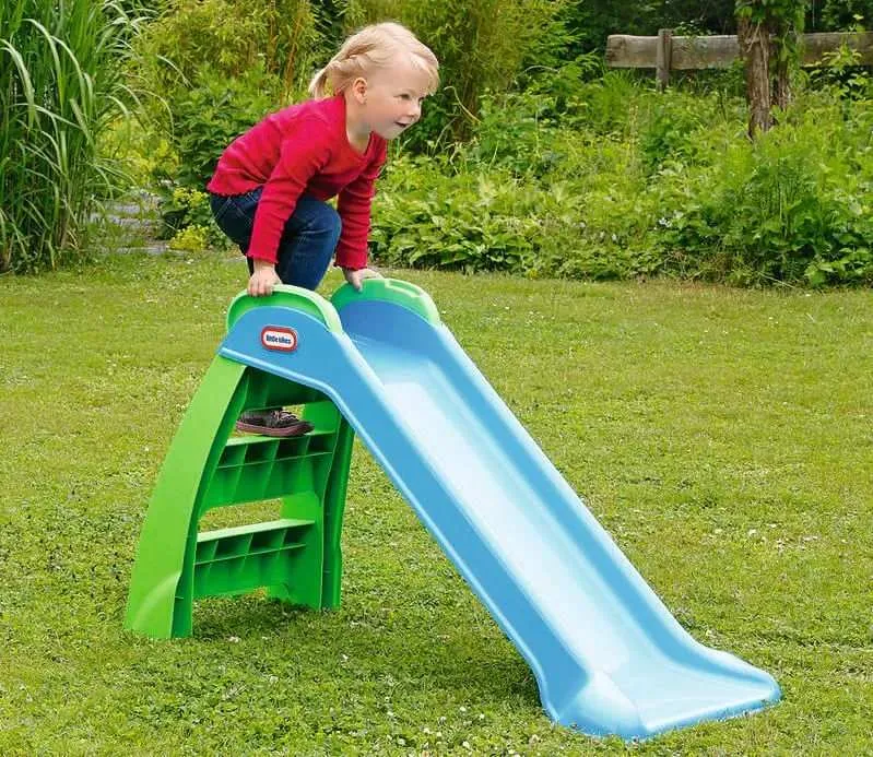Girl going down the Little Tikes First Slide.
