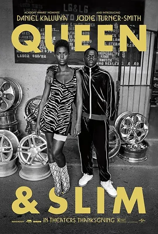 Black and white film poster for Queen & Slim with the couple standing together facing towards the camera.