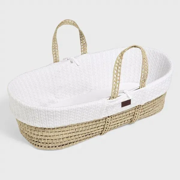 The Little Green Sheep Natural Knitted Moses Basket.