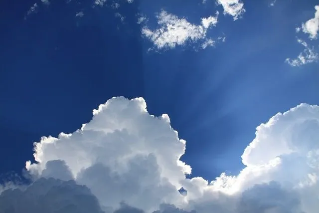 The view of white clouds in the sky with the sun shining through makes kids wonder what clouds are made of.