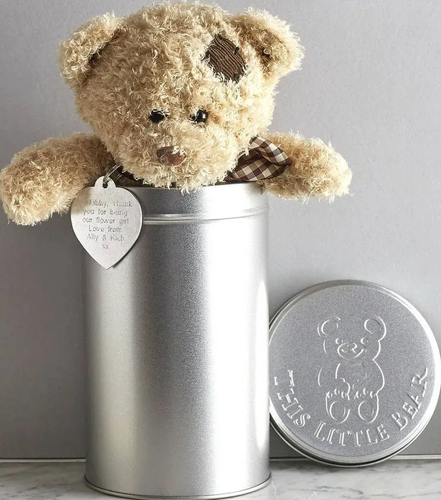 Adorable personalized Teddy bear in a tin is a unique gift for babies.