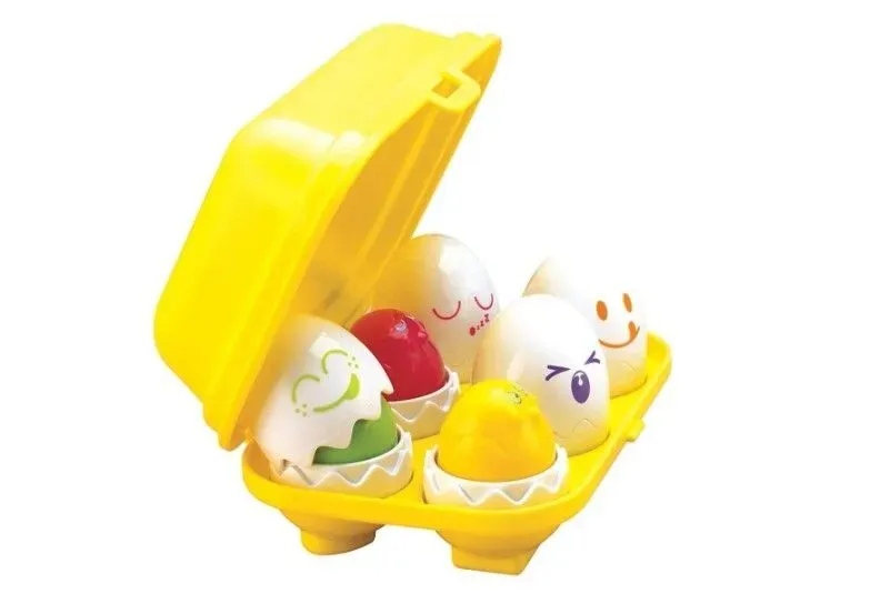 Set of hide and squeak egg in the yellow bow for fun learning style.