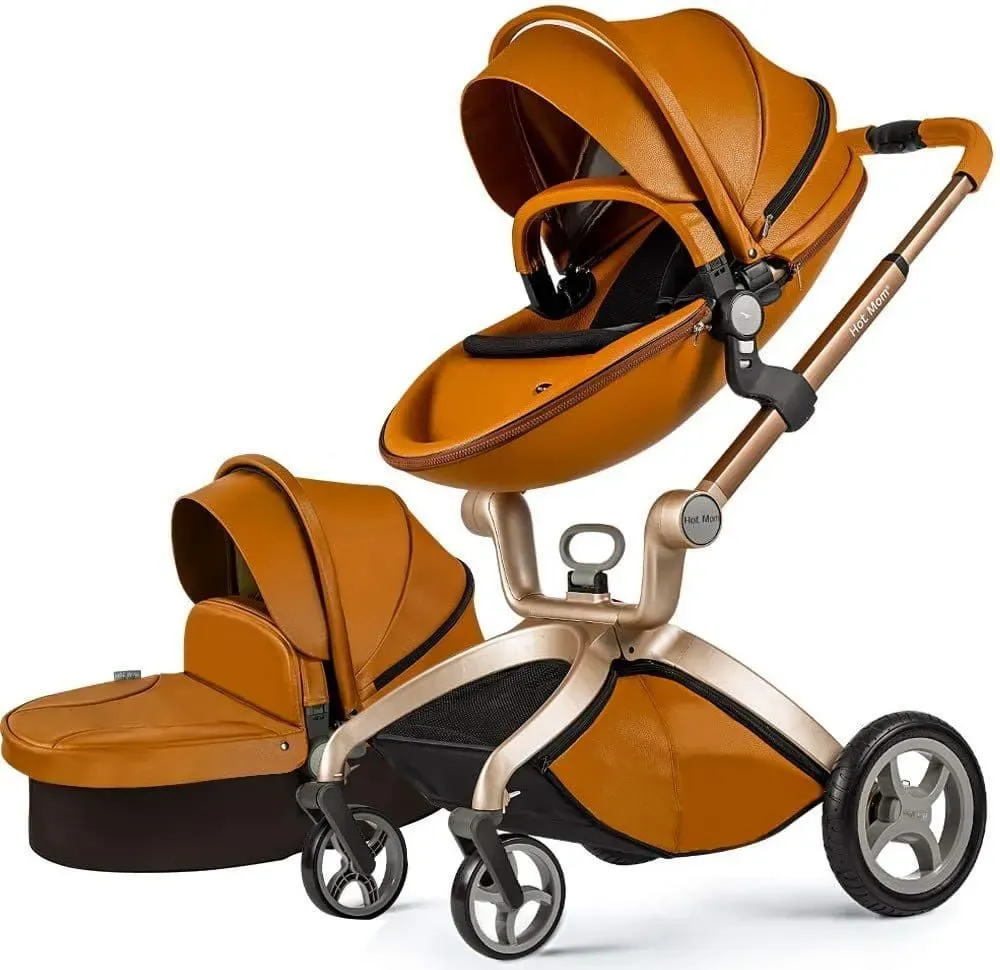 Leather brown black and rose gold metal baby stroller with bassinet.