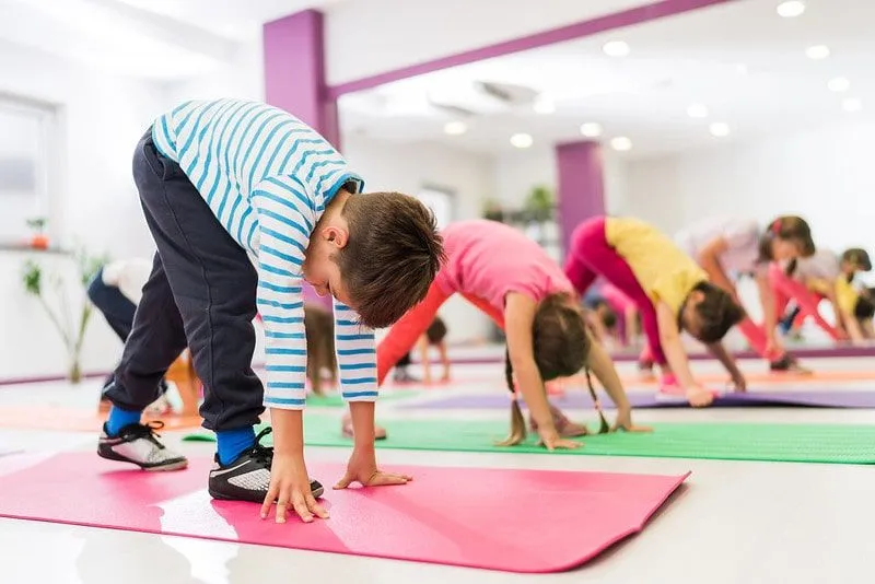 Children at a kids' exercise club class. Image