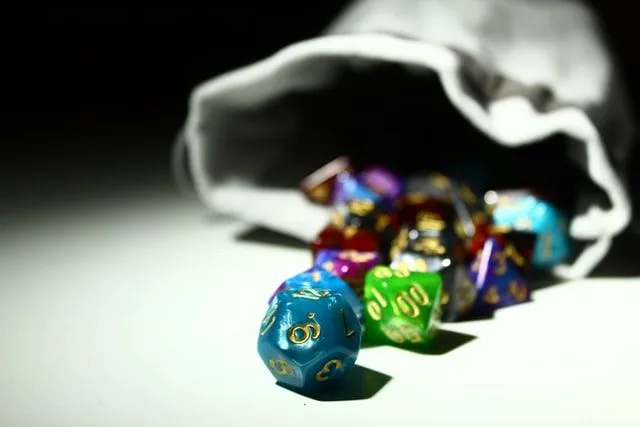 Colorful d20 dice scattered 