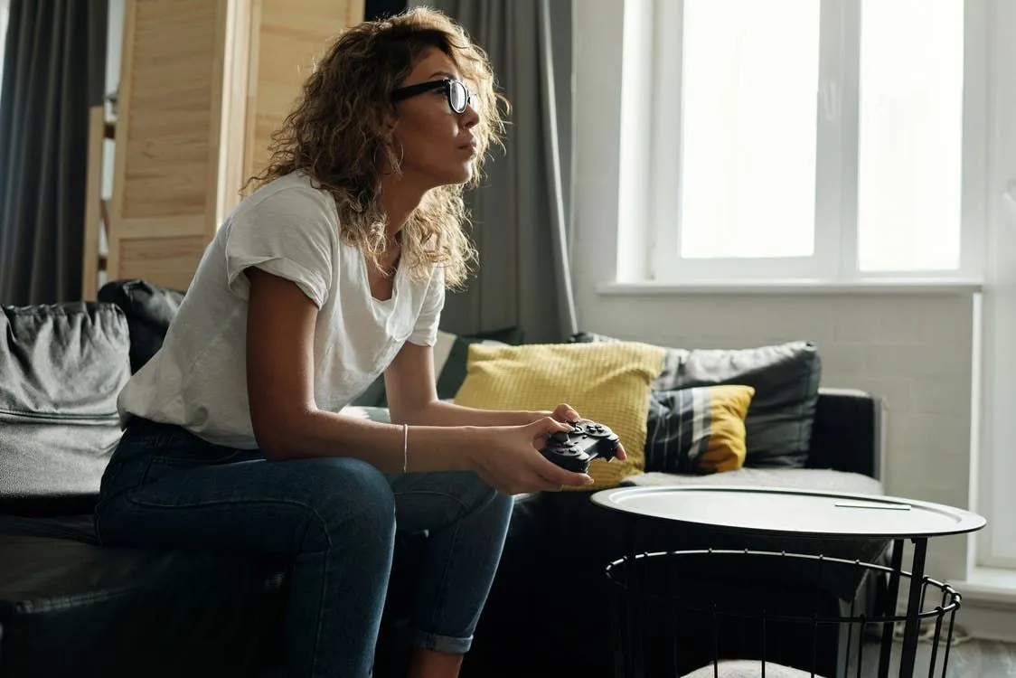 A female gamer playing video games