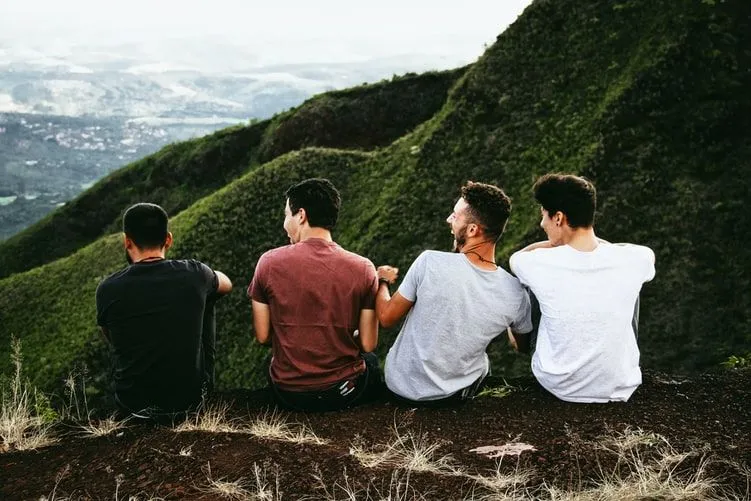 Four friends enjoying their time on the mountain