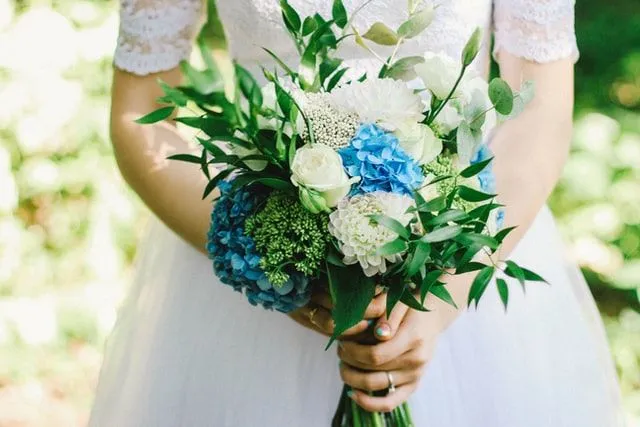 We love blue and white flowers in a wedding bouquet.