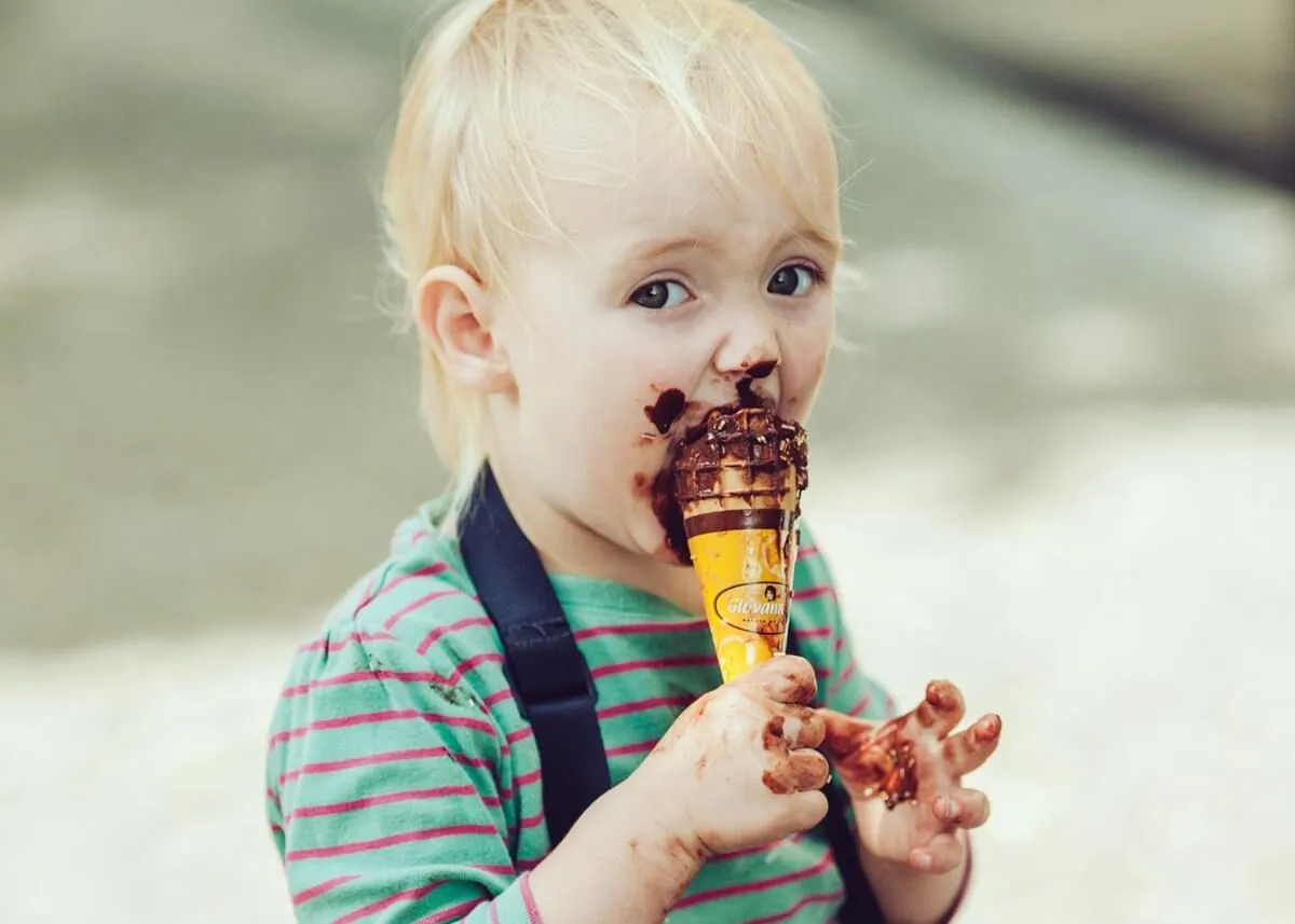 Messy kids with waffle cone too go hand-in-hand.