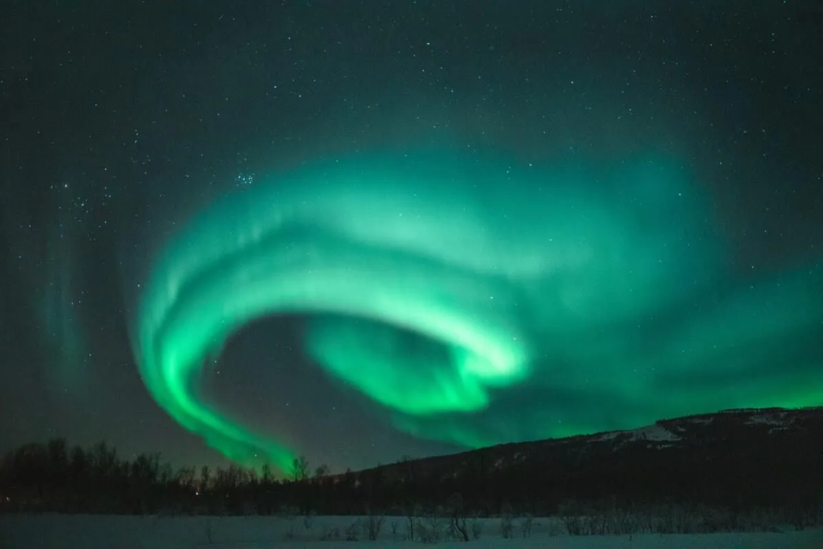 Some phenomena like airglow or noctilucent clouds are visible from the Earth.