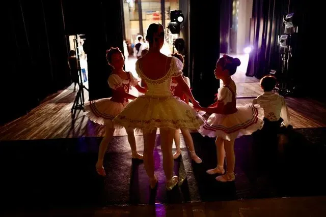 All children love the way their teacher teaches them ballet.