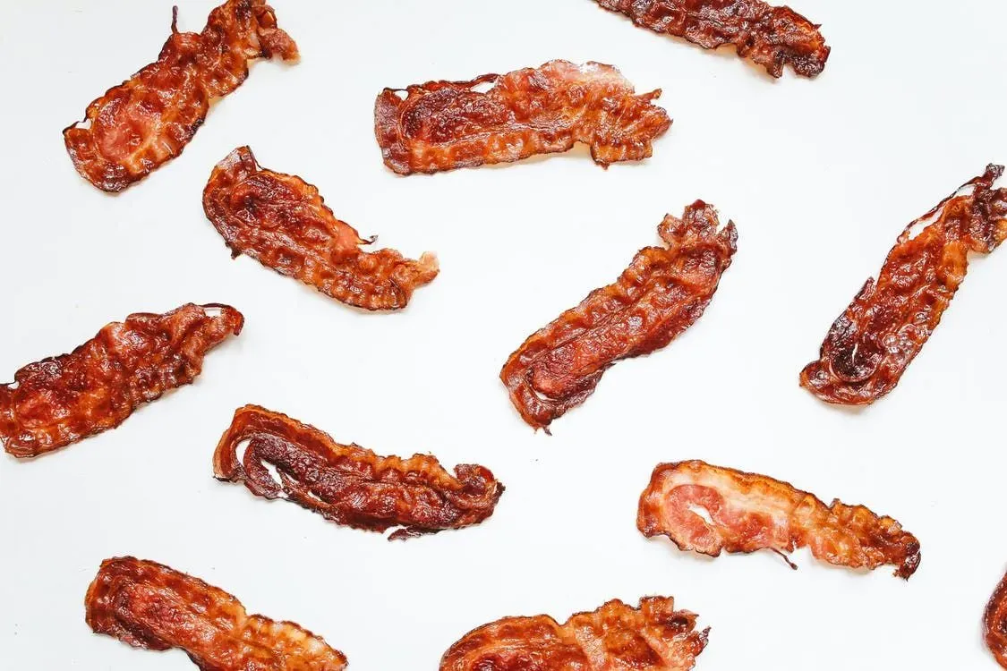 Funny bacon one-liners can be included in breakfast conversations.