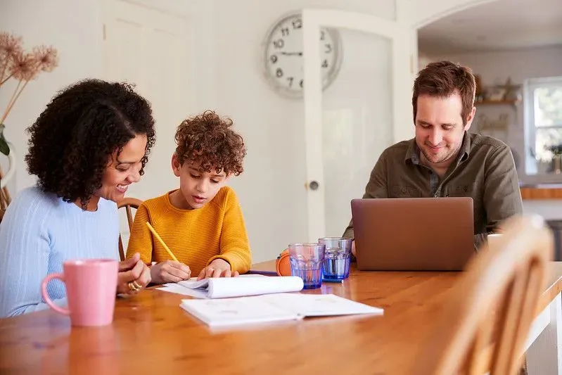 Homework often involves family members acting as home teachers to help students.