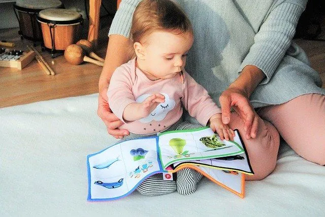 Your baby will love reading with you at this age.