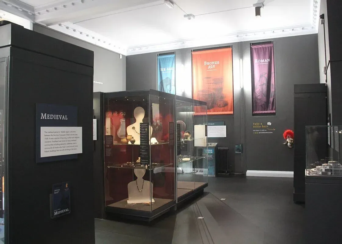 The interior of the museum at Southend Planetarium, with exhibits in glass cabinets.