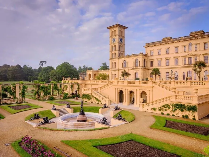 The Italian palazzo style architecture of Osborne House, surrounded by formal gardens.