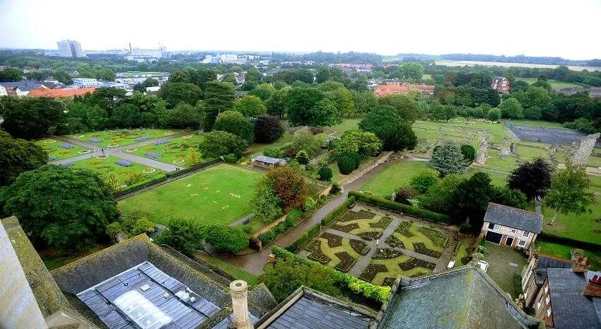 View from the Abbey of the Abbey Gardens and green lawns.