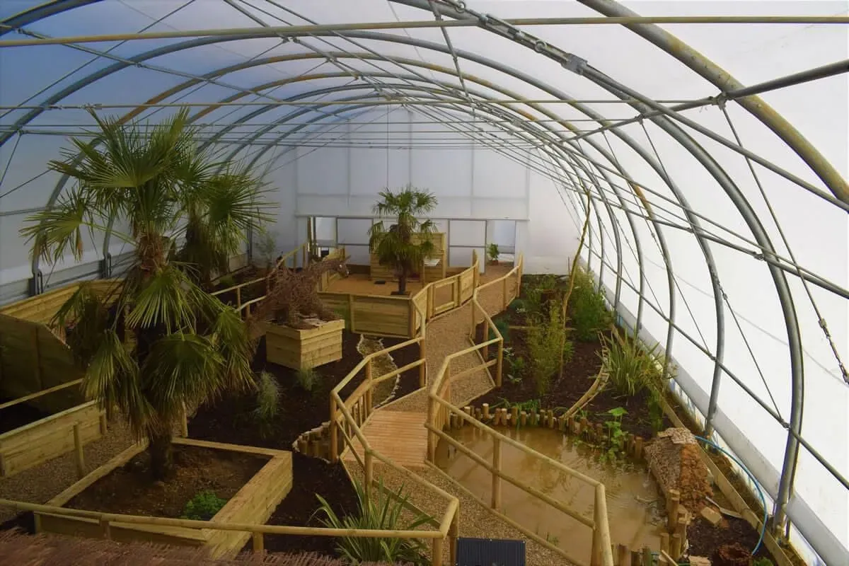 The interior of the reptile room and aviary at Jimmy's Farm and Wildlife Park.