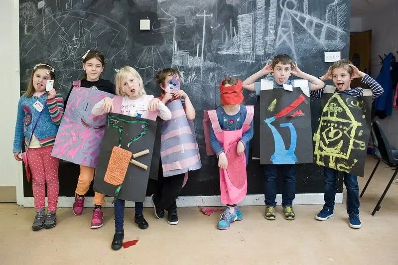 Laing Art Gallery craft event with kids showing off outfits.