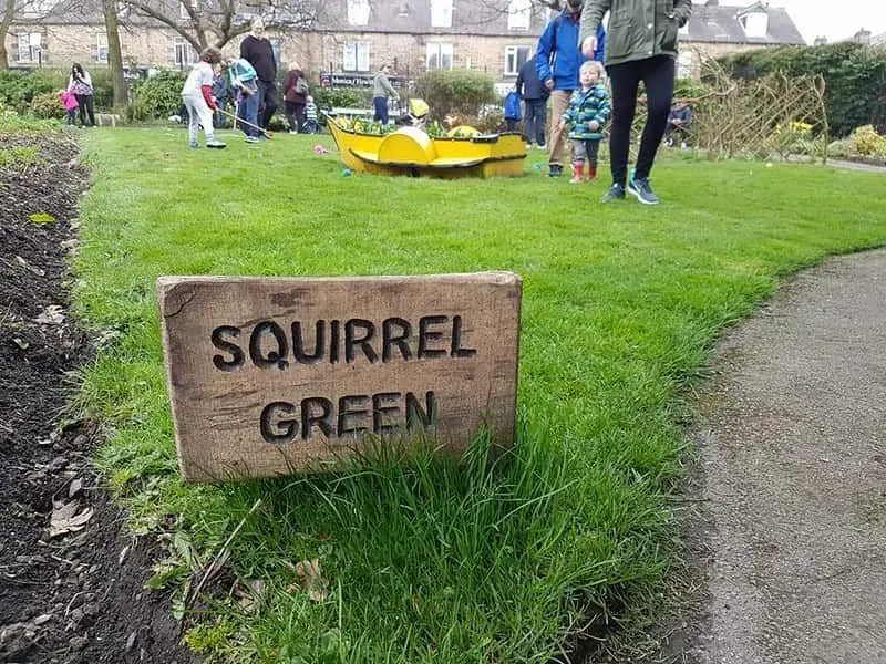 A sign for the squirrel garden at Hillsborough Park's Walled Garden.