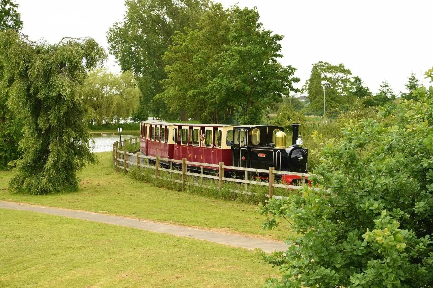 The train at Wicksteed Park among greenery