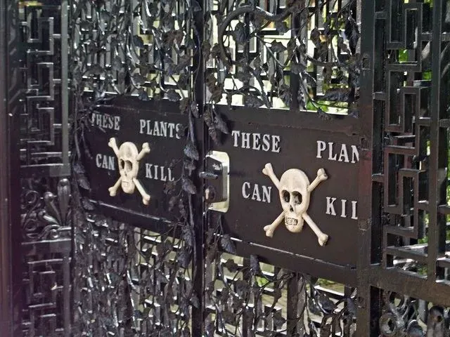 The Poison Garden gate, warning guests about the dangerous plants within.
