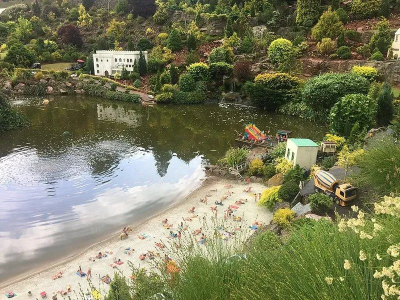Babbacombe Model Village lake with view of trees.