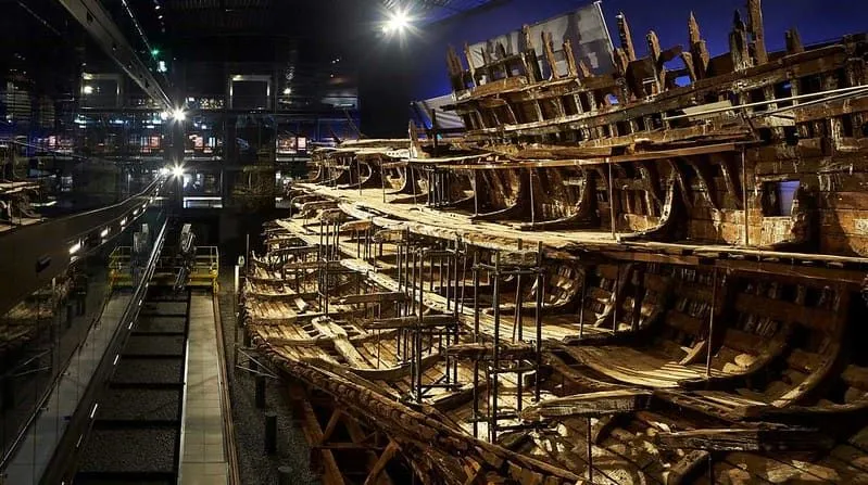 The Mary Rose shipwreck being reconstructed at The Mary Rose museum.