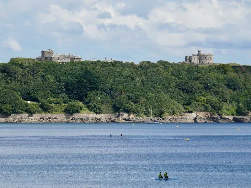 View of Pendennis Castle from sea, greenery in background.