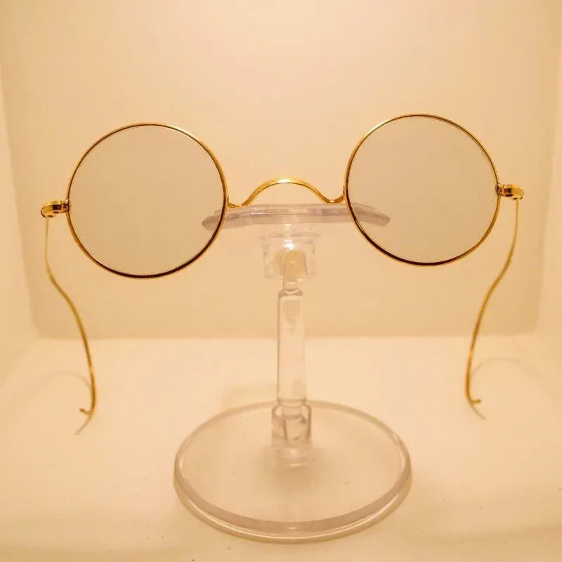 John Lennon's round glasses on display at the Liverpool Beatles Museum.