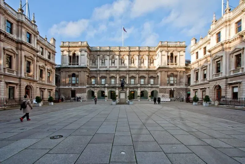 Exterior and courtyard of the Royal Academy of Arts in London.