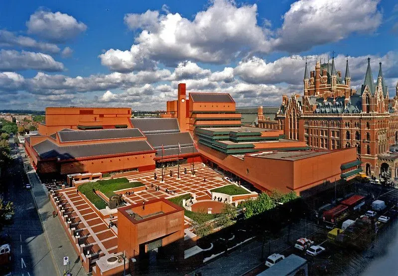 Aerial view of the British Library red/orange brick grounds on a cloudy day.