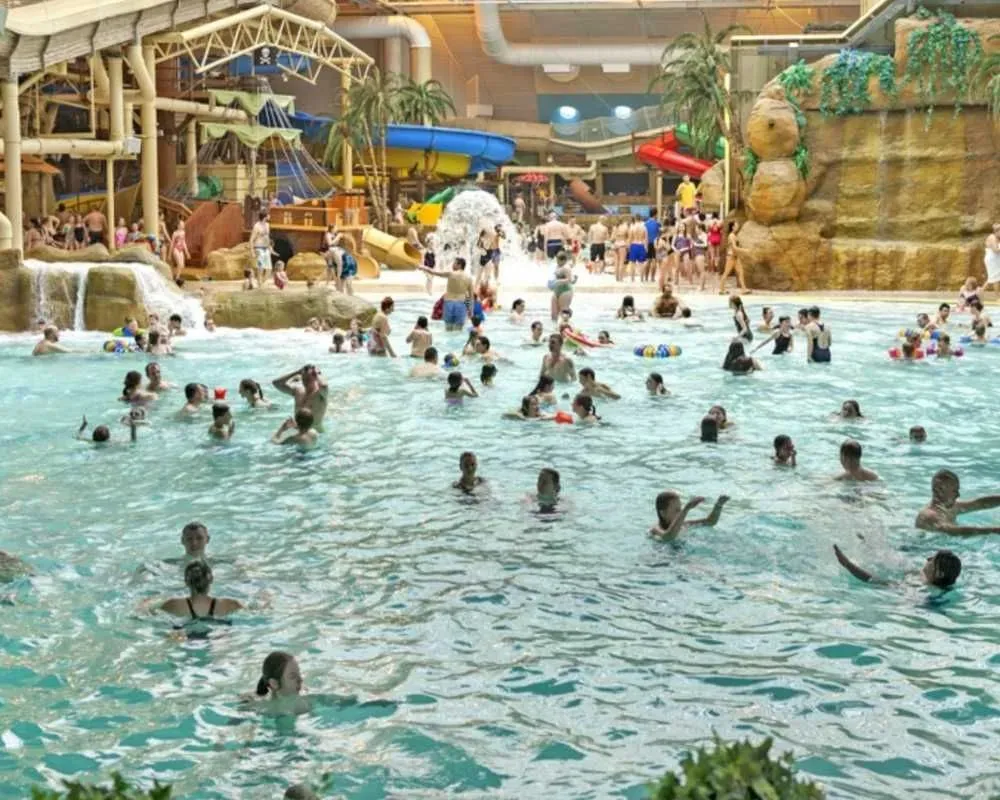 People swimming and playing in Typhoon Lagoon at Sandcastle Waterpark.