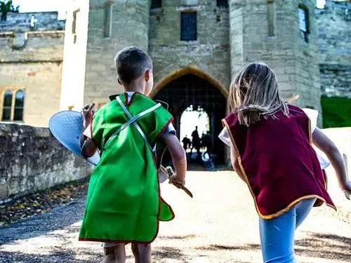 Children playing at the entrance of Warwick Castle.