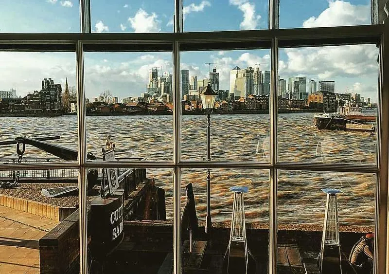 View of Canary Wharf and the River Thames from inside the Cutty Sark.