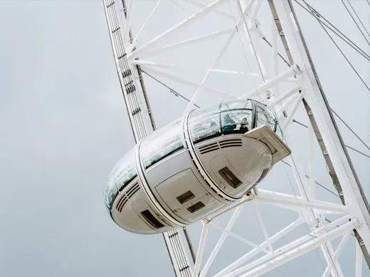 A London Eye pod against a cloudy sky.