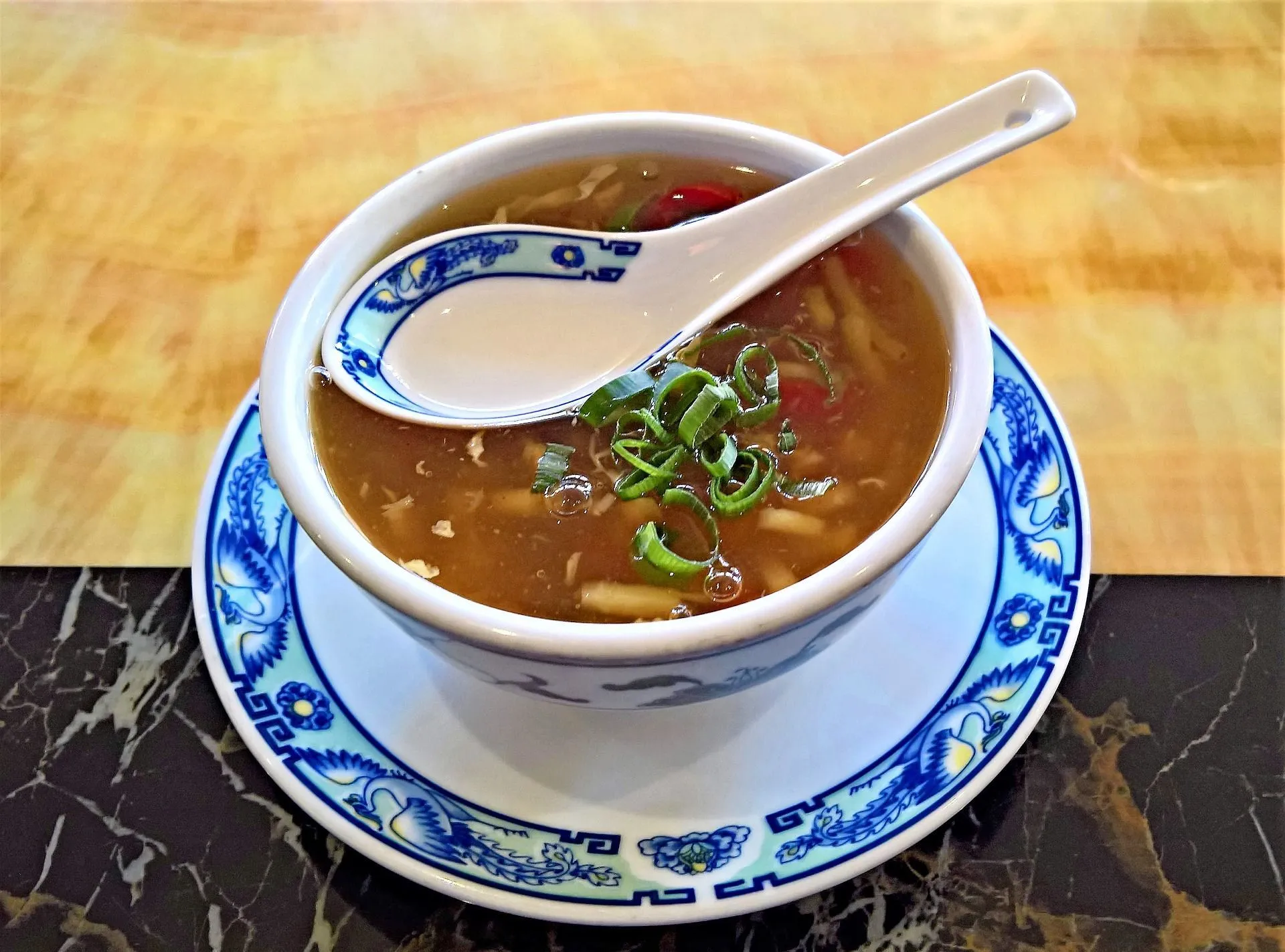 A bowl of hot and spicy soup is a perfect winter diet to ward off sniffles and chills.