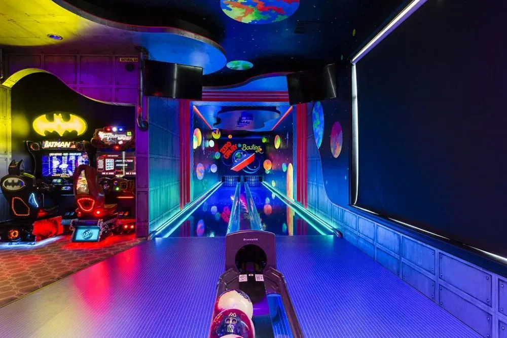 Play in this vacation rental's epic bowling alley.