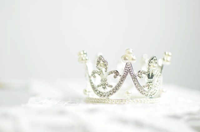 A queen is defined as a woman who rules a kingdom or is wedded to a king.