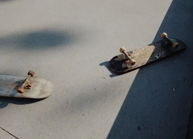 Skateboards lying on concrete