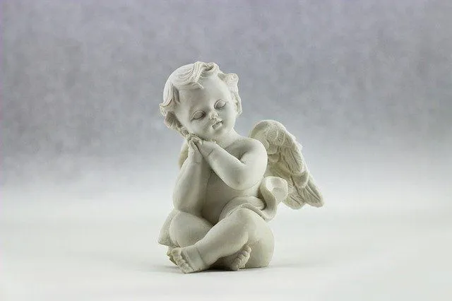 A statue of a little angel with wings