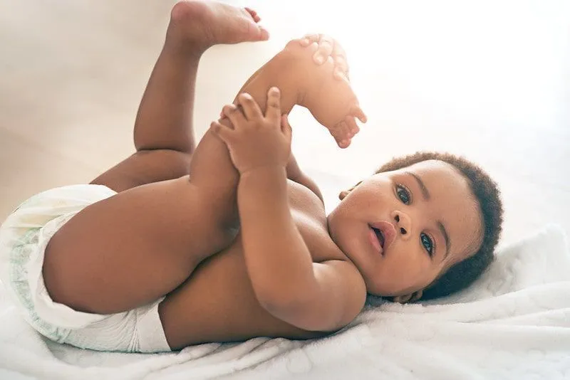 A newborn baby wearing diaper