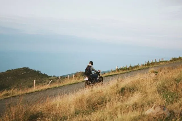 Boy riding a bike on the hill