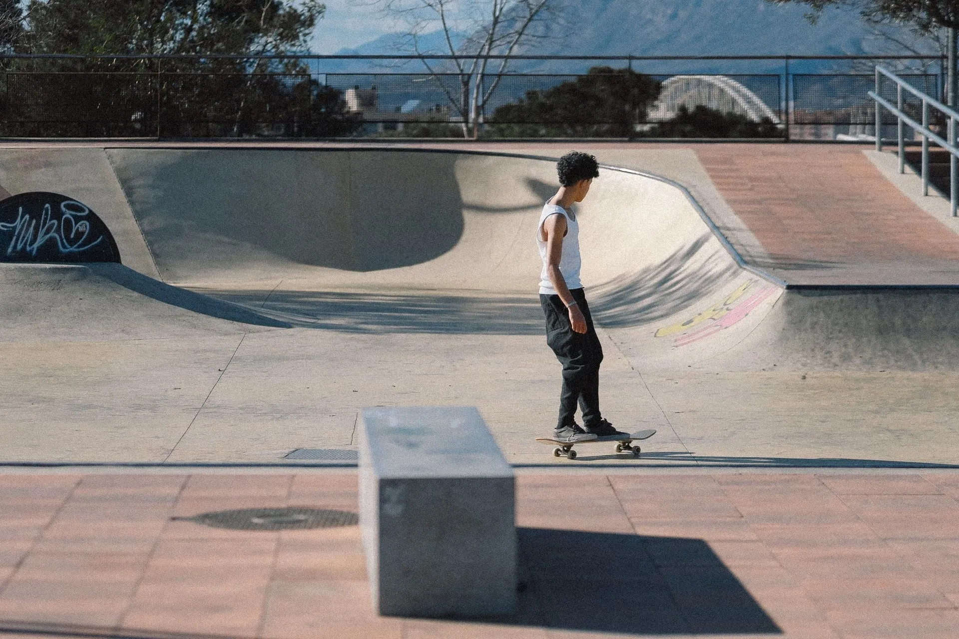 A boy skateboarding in a skatepark in Spain