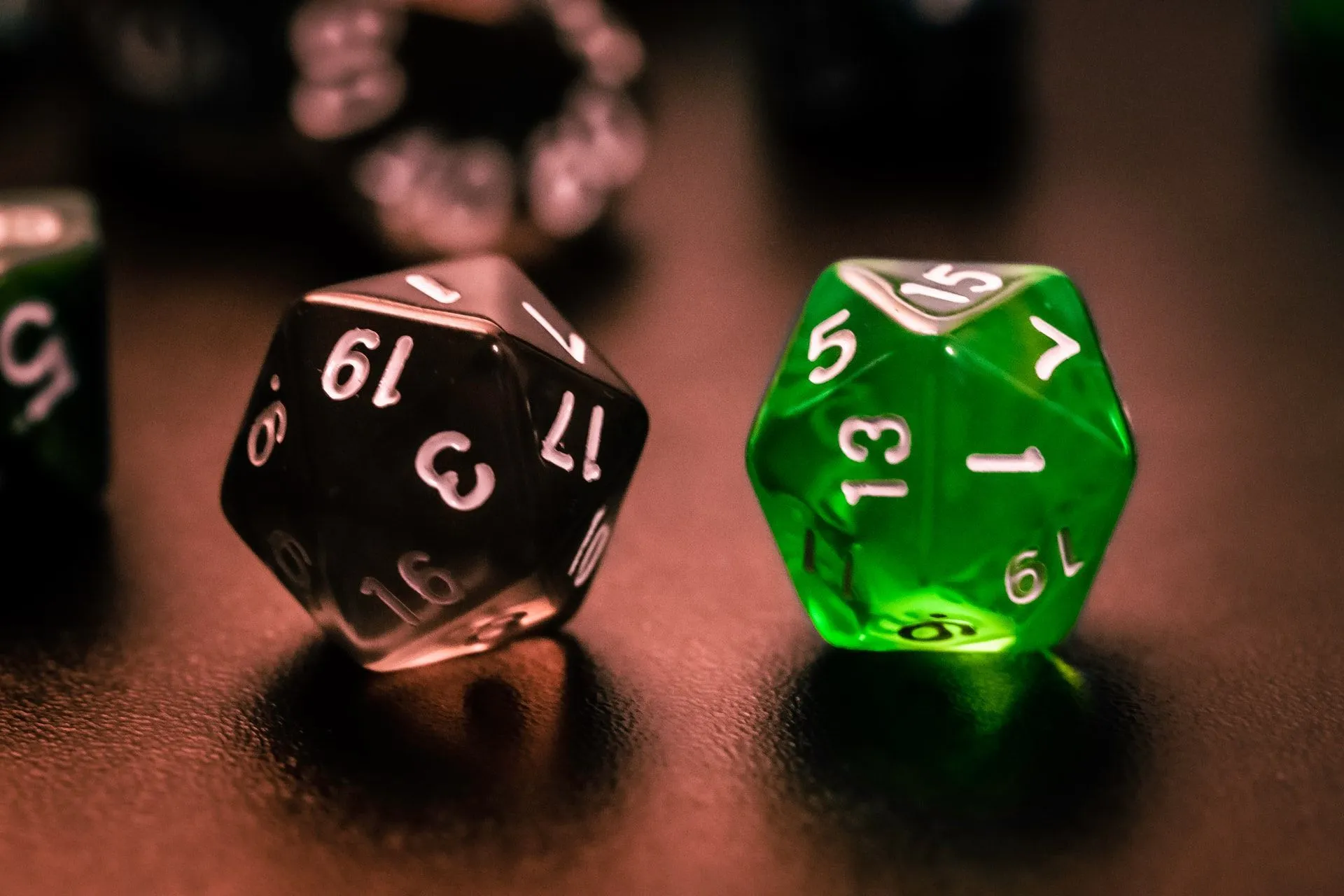 Black and green d20 dice from Dungeons and dragons