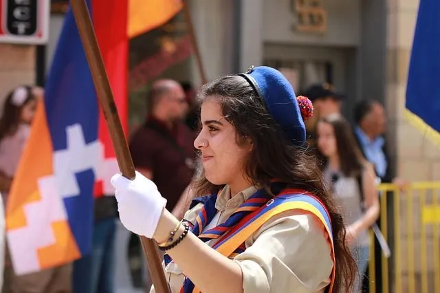 Armenian scout girl holding flag